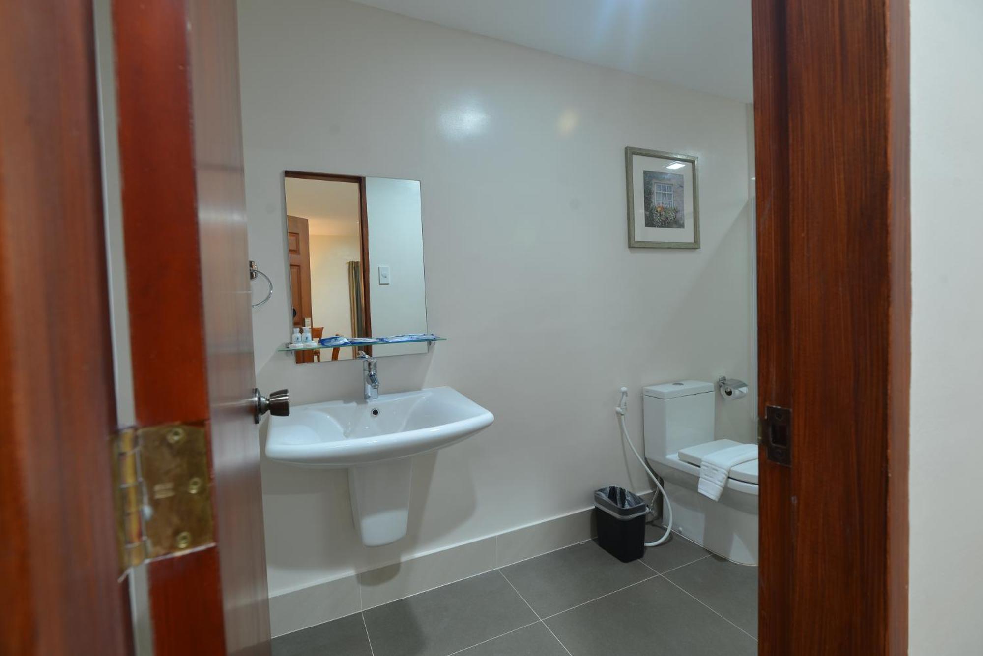 Royal Suites Condotel Kalibo Phòng bức ảnh